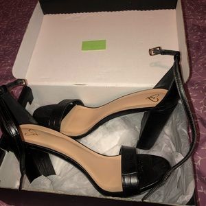 Black snakeskin heels